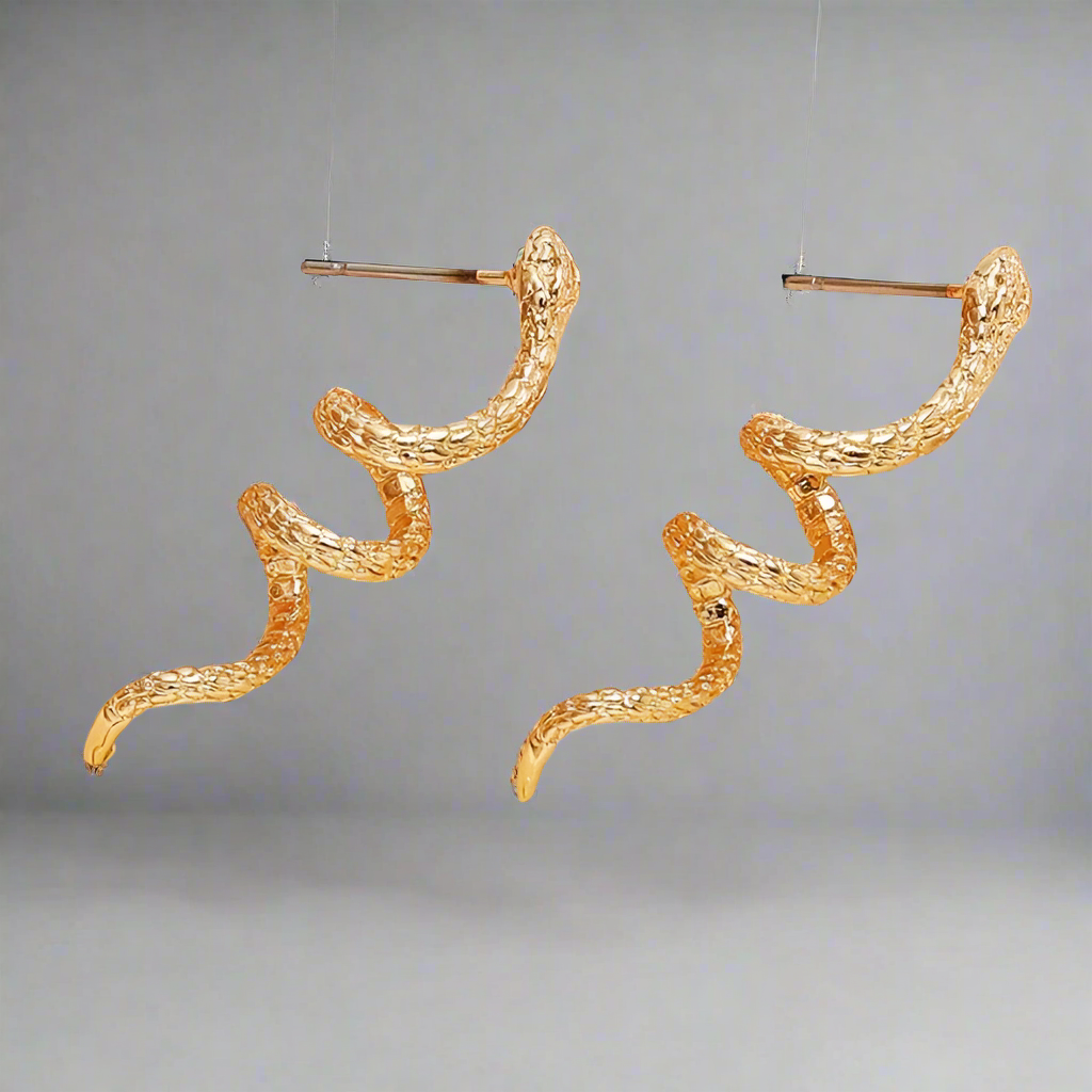 SNAKE-EARING